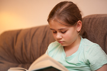 Image showing Girl reading book