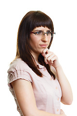 Image showing Pensive young attractive girl with glasses