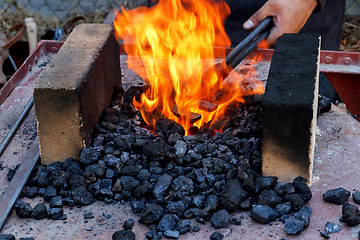 Image showing blacksmith furnace with burning coals 