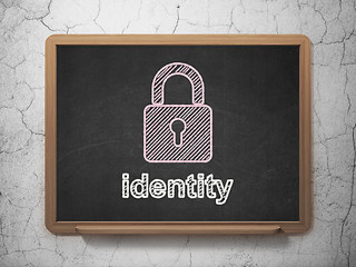 Image showing Safety concept: Closed Padlock and Identity on chalkboard background