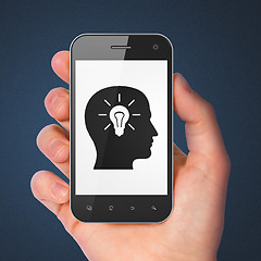 Image showing Data concept: Head With Light Bulb on smartphone