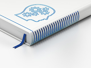 Image showing Marketing concept: closed book, Head With Gears on white background
