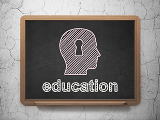 Image showing Education concept: Head With Keyhole and Education on chalkboard background