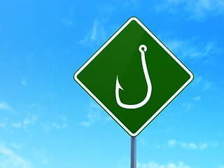 Image showing Protection concept: Fishing Hook on road sign background