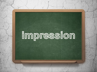 Image showing Advertising concept: Impression on chalkboard background