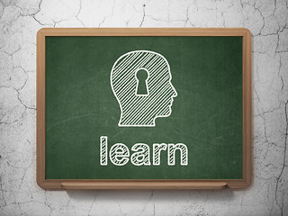 Image showing Education concept: Head With Keyhole and Learn on chalkboard background