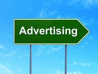 Image showing Advertising on road sign background