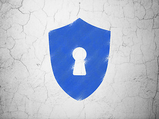 Image showing Privacy concept: Shield With Keyhole on wall background
