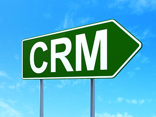 Image showing Finance concept: CRM on road sign background