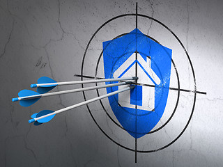 Image showing Safety concept: arrows in Shield target on wall background