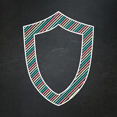Image showing Protection concept: Contoured Shield on chalkboard background