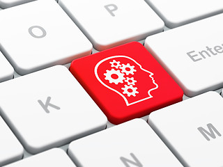 Image showing Advertising concept: Head With Gears on computer keyboard background