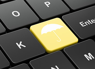 Image showing Privacy concept: Umbrella on computer keyboard background