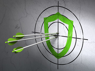 Image showing Privacy concept: arrows in Contoured Shield target on wall background