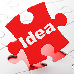 Image showing Advertising concept: Idea on puzzle background