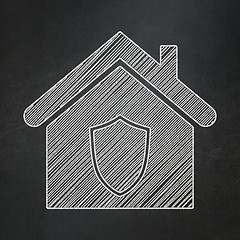 Image showing Finance concept: Home on chalkboard background