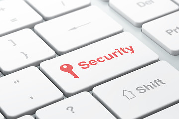 Image showing Safety concept: Key and Security on computer keyboard background