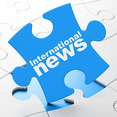 Image showing International News on puzzle background