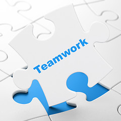 Image showing Business concept: Teamwork on puzzle background