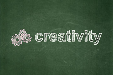 Image showing Marketing concept: Gears and Creativity on chalkboard background