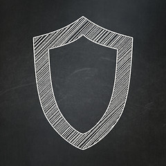 Image showing Security concept: Contoured Shield on chalkboard background