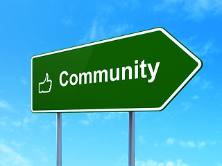 Image showing Social network concept: Community and Thumb Up on road sign