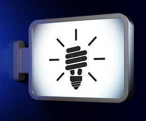 Image showing Business concept: Energy Saving Lamp on billboard background