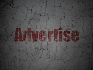 Image showing Advertising concept: Advertise on grunge wall background