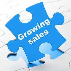 Image showing Finance concept: Growing Sales on puzzle background