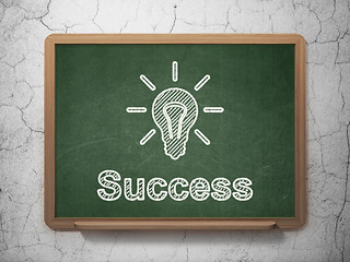 Image showing Finance concept: Light Bulb and Success on chalkboard background