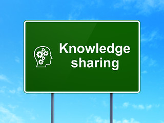 Image showing Education concept: Knowledge Sharing and Head Gears on road sign