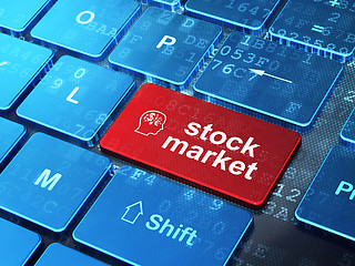 Image showing Head With Finance Symbol and Stock Market on keyboard