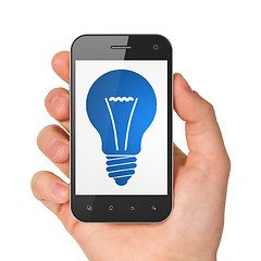 Image showing Finance concept: Light Bulb on smartphone