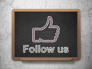 Image showing Social media concept: Thumb Up and Follow us on chalkboard background