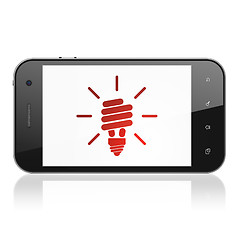 Image showing Business concept: Energy Saving Lamp on smartphone