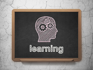 Image showing Education concept: Head With Gears and Learning on chalkboard background