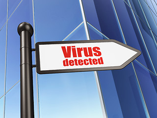 Image showing Protection concept: sign Virus Detected on Building background