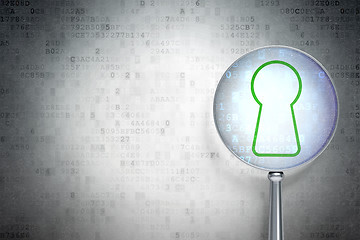 Image showing Protection concept:  Keyhole with optical glass on digital background