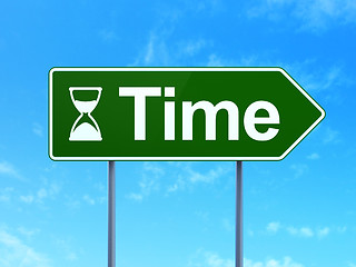 Image showing Timeline concept: Time and Hourglass on road sign background