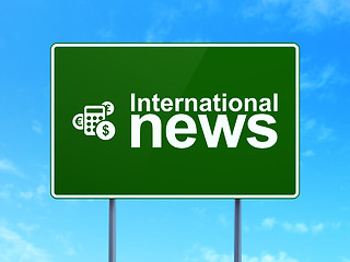Image showing International News and Calculator on road sign background