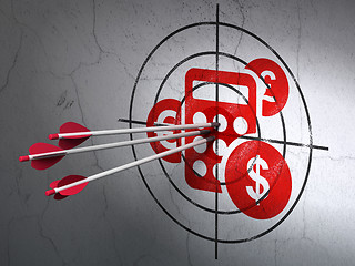 Image showing Marketing concept: arrows in Calculator target on wall background