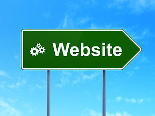 Image showing Web design concept: Website and Gears on road sign background