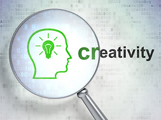 Image showing Advertising concept: Head With Lightbulb and Creativity optical glass