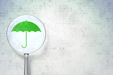 Image showing Safety concept:  Umbrella with optical glass on digital background