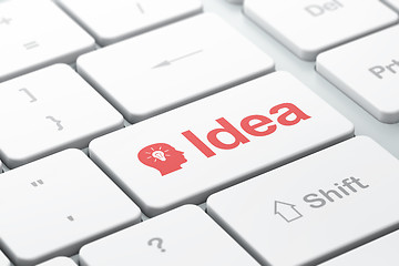Image showing Advertising concept: Head With Light Bulb and Idea on keyboard