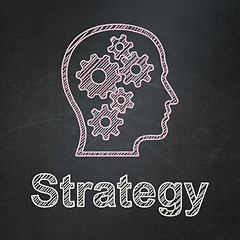 Image showing Business concept: Head With Gears and Strategy on chalkboard background