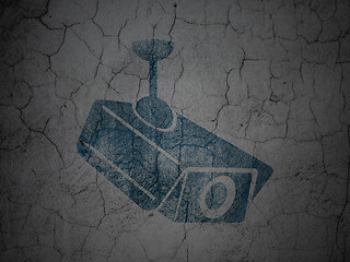 Image showing Protection concept: Cctv Camera on grunge wall background