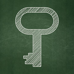 Image showing Safety concept: Key on chalkboard background