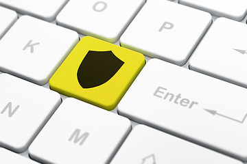 Image showing Privacy concept: Shield on computer keyboard background