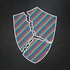 Image showing Security concept: Broken Shield on chalkboard background